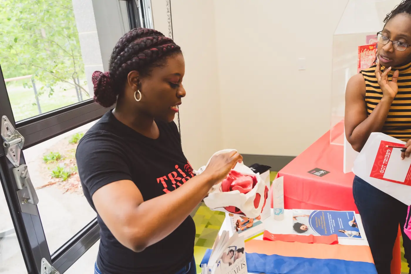 A Red Tribe Community facilitator leading an age-appropriate learning experience